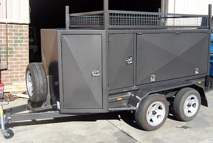 Lawn mowing trailers